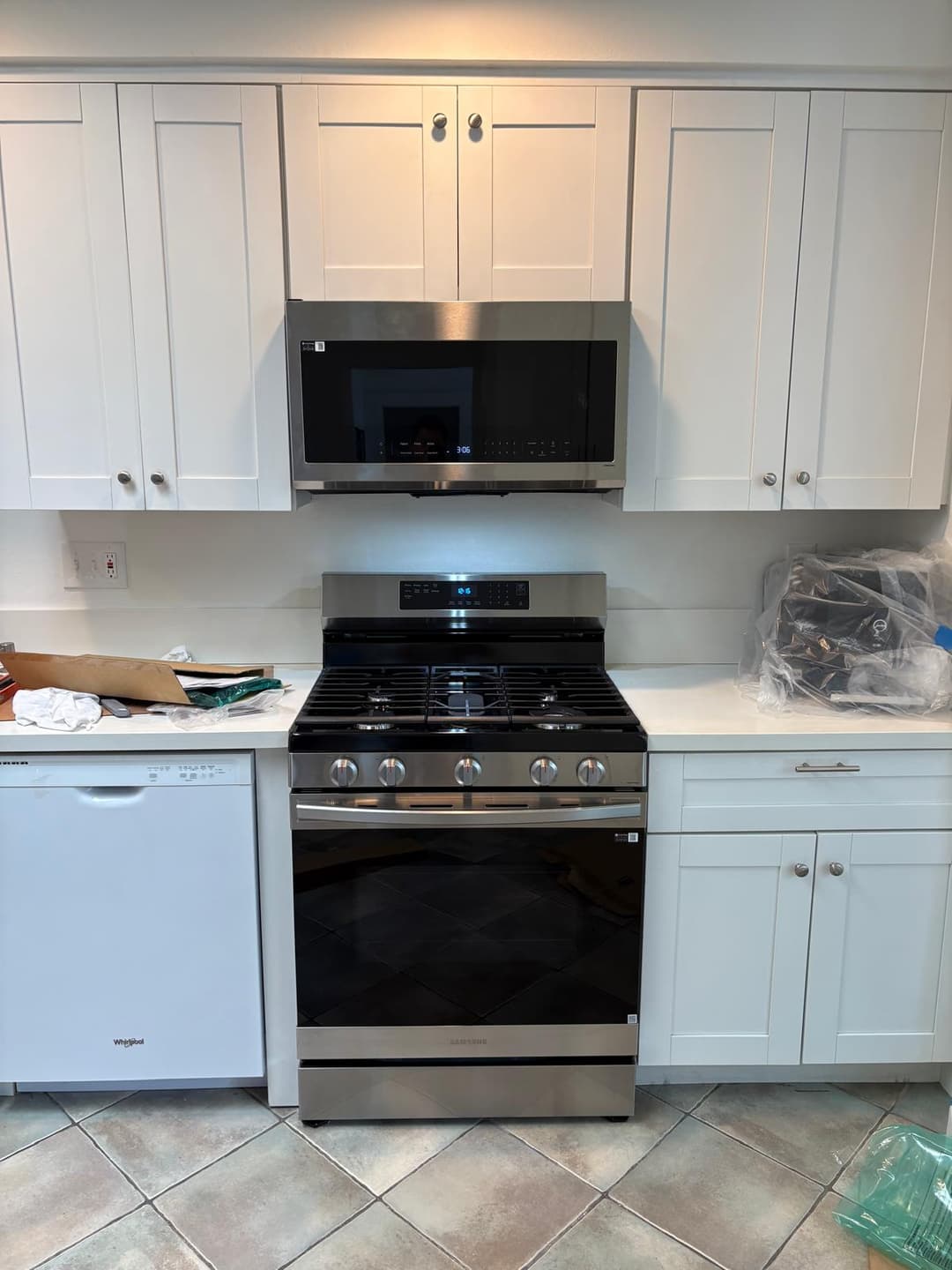 picture of newly remodeled stove with stainless steel microwave